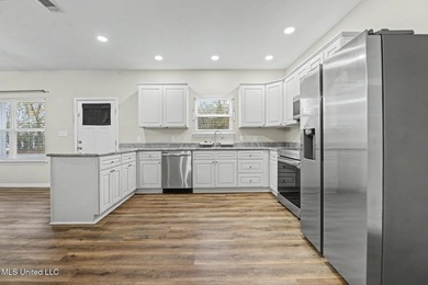 Modern construction. Added privacy. No flood insurance required - photo 9