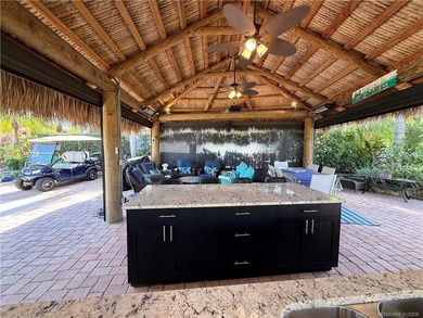 Located on the large lake with double fountains, this is truly - photo 11