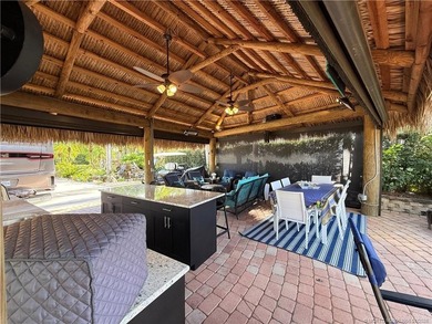 Located on the large lake with double fountains, this is truly - photo 12