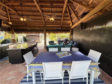 Located on the large lake with double fountains, this is truly - photo 13