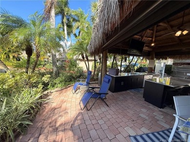 Located on the large lake with double fountains, this is truly - photo 15