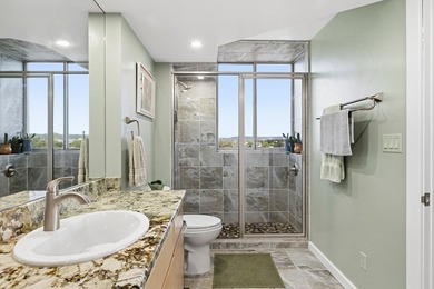 This corner-unit condo offers a perfect blend of modern luxury - photo 19