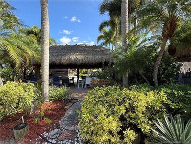 Located on the large lake with double fountains, this is truly - photo 20