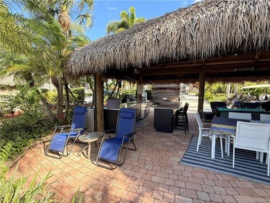 Located on the large lake with double fountains, this is truly - photo 21
