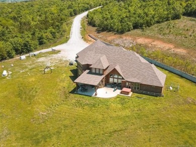 Seated atop a great hill, overlooking the land below &amp; the