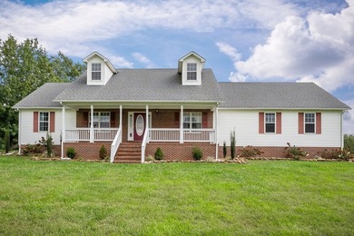 This custom built one level home is situated on a peaceful 13.04 - photo 3