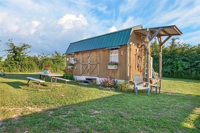 Tiny home on 3 plus acres. Park like setting. Very private - photo 47