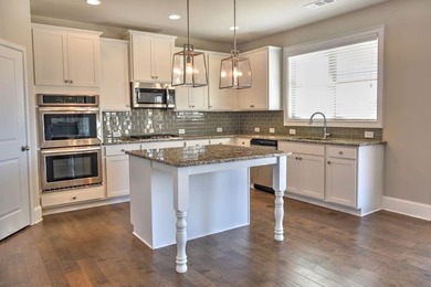 Claire +2 Plan Lot 142: 5BR/ 3BA Experience serene lakeside - photo 6