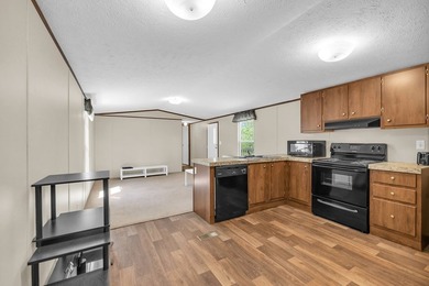 Nestled in the heart of the Lakelands, this homeoffers a rare - photo 3