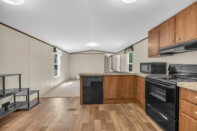 Nestled in the heart of the Lakelands, this homeoffers a rare - photo 4