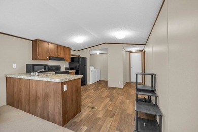 Nestled in the heart of the Lakelands, this homeoffers a rare - photo 5