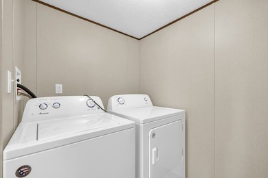 Nestled in the heart of the Lakelands, this homeoffers a rare - photo 6