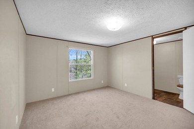 Nestled in the heart of the Lakelands, this homeoffers a rare - photo 9