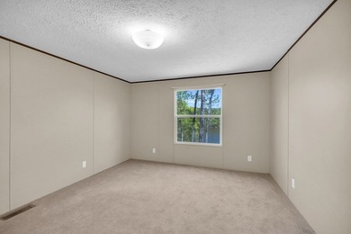 Nestled in the heart of the Lakelands, this homeoffers a rare - photo 10