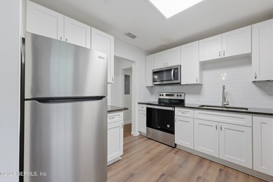Experience refined living in this meticulously maintained - photo 10