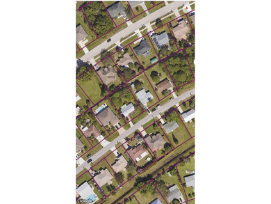 The property at 1843 SE North Buttonwood Drive is located in a - photo 1