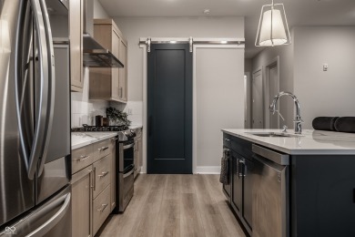 An absolutely stunning 2 bedroom, 2.5 bathroom condominium and