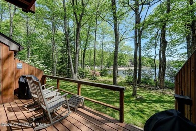 ***LAKEFRONT***AND SLEEPING LOFT. Nestled in the serene and - photo 3