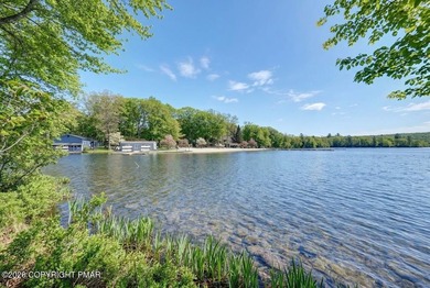 ***LAKEFRONT***AND SLEEPING LOFT. Nestled in the serene and - photo 5