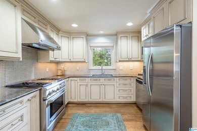 Welcome to this beautifully maintained 5-bedroom, 3-bath brick - photo 13