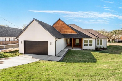 New Construction! This 4 bedroom 2.1 bath Contemporary Modern - Lake Home For Sale in Runaway Bay, Texas