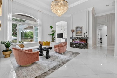 Situated on an oversized lot within the gated community of Azura - photo 3
