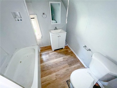 This spacious 4-bedroom, 1.5-bath Colonial in the City of - photo 11