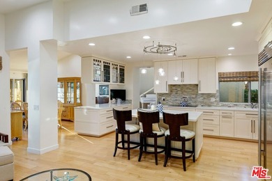 Set within the prestigious enclave of Malibu Country Estates - photo 11