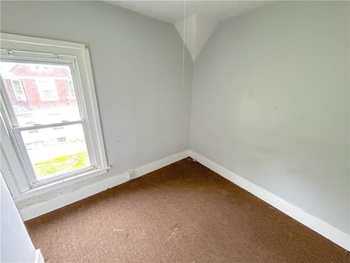 This spacious 4-bedroom, 1.5-bath Colonial in the City of - photo 12