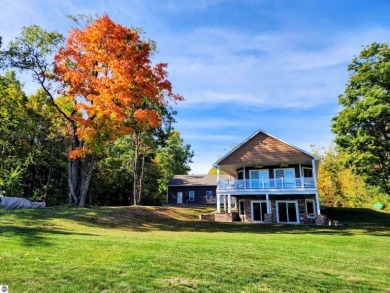 (private lake, pond, creek) Home For Sale in Elmira Michigan