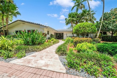 Nestled on a lush builder's acre along a quiet winding street in - photo 2