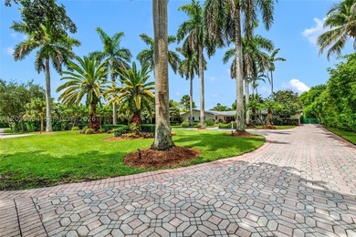 Nestled on a lush builder's acre along a quiet winding street in - photo 3
