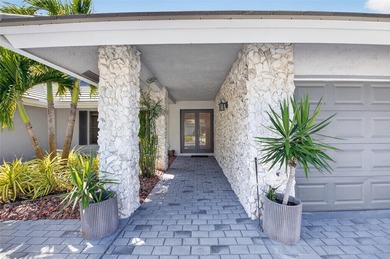 Discover 10182 Boca Woods Ln, a refined estate in Boca Raton's - photo 8