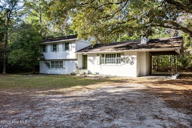 Tucked away on a quiet, private gravel road, this 2.76-acre - photo 2