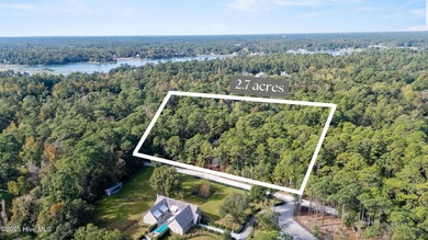Tucked away on a quiet, private gravel road, this 2.76-acre - photo 3