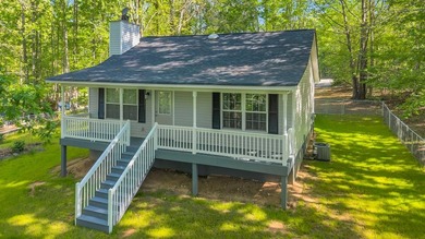 Located on the serene Reedy River arm of Lake Greenwood lies 425 - Lake Home Active Under Contract in Waterloo, South Carolina