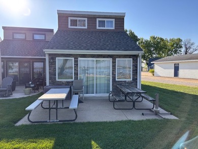Experience the best of refined lake living with this exceptional - photo 1