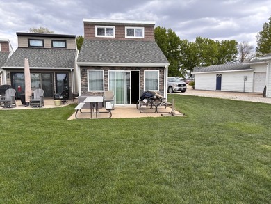 Experience the best of refined lake living with this exceptional - photo 2