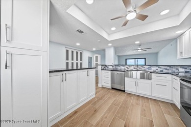 Welcome Home to the ultimate in Coastal Living with this fully - photo 11
