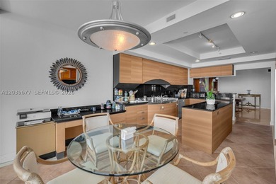 This exceptional 3-bedroom, 4.5-bath sky residence is nestled - photo 3