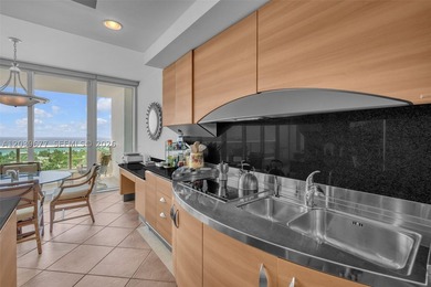 This exceptional 3-bedroom, 4.5-bath sky residence is nestled - photo 4