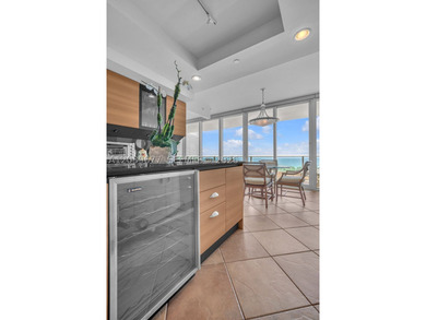 This exceptional 3-bedroom, 4.5-bath sky residence is nestled - photo 7