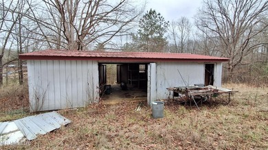 HUGE potential on this fixer-upper on 14+- acres with a shop! 3 - photo 8