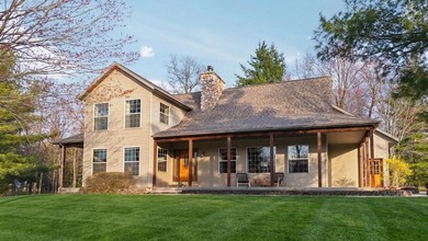 406' of Lake St. Helen frontage and a stunning home nestled on - photo 1