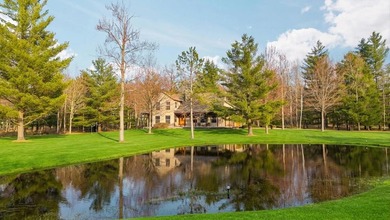 406' of Lake St. Helen frontage and a stunning home nestled on - photo 2