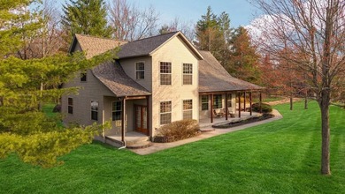 406' of Lake St. Helen frontage and a stunning home nestled on - photo 3