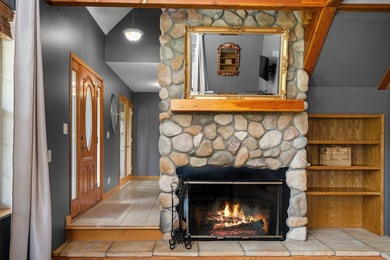 406' of Lake St. Helen frontage and a stunning home nestled on - photo 8
