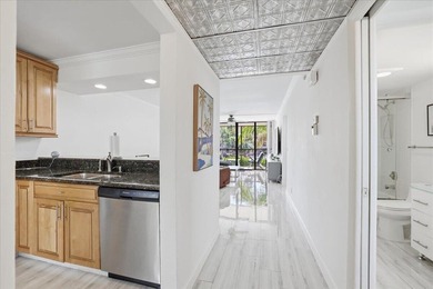 Enjoy waterfront living in Boca Bayou, one of East Boca Raton's - photo 2