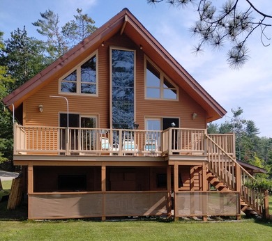 This unique home has incredible, beachfront on scenic Ess Lake - photo 4