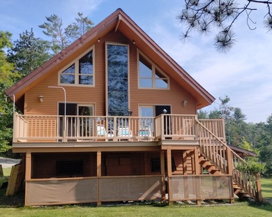 This unique home has incredible, beachfront on scenic Ess Lake - photo 5